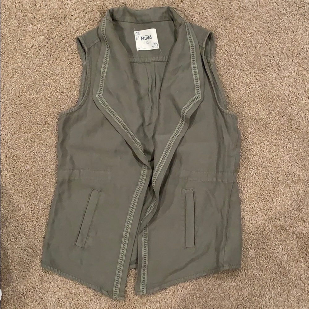 Earthy green vest. Very trendy
